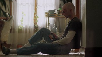 Movie still from “Pendant - Static Dream” (2022), directed by Ramez Silyan – Medium shot, Low angle