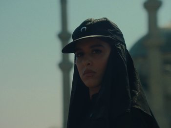 Movie still from “Marina Satti - Yiati Pouli M” (2022), directed by Alexis Gómez – Close Up shot, Low angle
