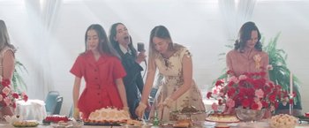 Movie still from “Haim - Lost Track” (2022), directed by Paul Thomas Anderson – Medium shot, Low angle