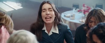 Movie still from “Haim - Lost Track” (2022), directed by Paul Thomas Anderson – Medium shot, High angle