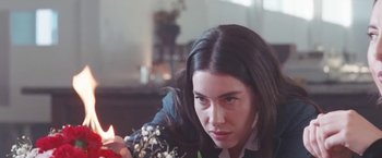 Movie still from “Haim - Lost Track” (2022), directed by Paul Thomas Anderson – Close Up shot, High angle