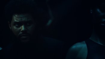 Movie still from “The Weeknd - Gasoline” (2022), directed by Matilda Finn – Close Up shot, Over the shoulder angle