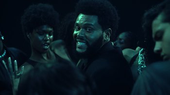 Movie still from “The Weeknd - Gasoline” (2022), directed by Matilda Finn – Close Up shot, Over the shoulder angle