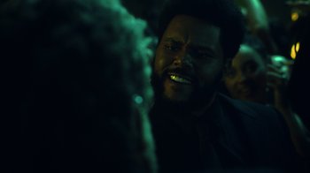 Movie still from “The Weeknd - Gasoline” (2022), directed by Matilda Finn – Close Up shot, Over the shoulder angle