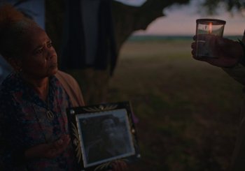 Movie still from “Nego Bala - Sonho” (2021), directed by Douglas Bernardt – Extreme Close Up shot, Over the shoulder angle