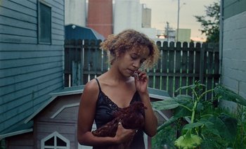 Movie still from “Jurdan Bryant - Enough” (2021), directed by Alonzo Hellerbach – Medium shot, Low angle