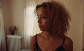 Movie still from “Jurdan Bryant - Enough” (2021), directed by Alonzo Hellerbach – Close Up shot, Over the shoulder angle