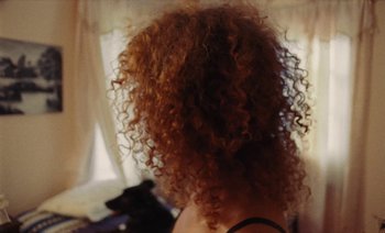 Movie still from “Jurdan Bryant - Enough” (2021), directed by Alonzo Hellerbach – Close Up shot, Over the shoulder angle