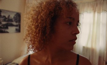 Movie still from “Jurdan Bryant - Enough” (2021), directed by Alonzo Hellerbach – Close Up shot, Over the shoulder angle
