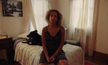 Movie still from “Jurdan Bryant - Enough” (2021), directed by Alonzo Hellerbach – Medium shot, High angle