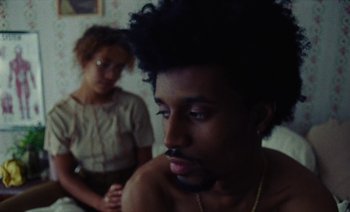 Movie still from “Jurdan Bryant - Enough” (2021), directed by Alonzo Hellerbach – Close Up shot, Over the shoulder angle