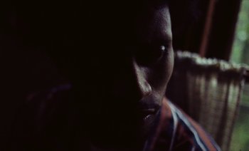 Movie still from “Jurdan Bryant - Enough” (2021), directed by Alonzo Hellerbach – Extreme Close Up shot, High angle