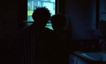 Movie still from “Jurdan Bryant - Enough” (2021), directed by Alonzo Hellerbach – Medium shot, Over the shoulder angle