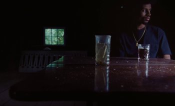 Movie still from “Jurdan Bryant - Enough” (2021), directed by Alonzo Hellerbach – Extreme Close Up shot, High angle