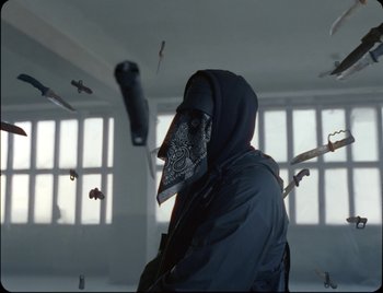 Movie still from “Ziak - Akimbo” (2021), directed by Bleu Désert – Medium shot, Low angle