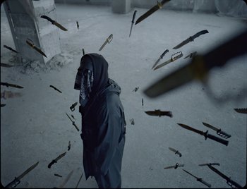 Movie still from “Ziak - Akimbo” (2021), directed by Bleu Désert – Medium shot, High angle