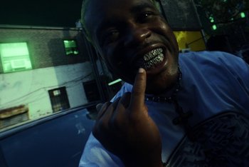 Movie still from “A$AP Ferg - Green Juice” (2021), directed by Valentin Petit – Close Up shot, Low angle