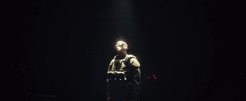 Movie still from “Husky - Invisible” (2021), directed by Evgenii Bakirov – Medium shot, Low angle