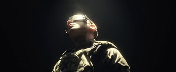 Movie still from “Husky - Invisible” (2021), directed by Evgenii Bakirov – Close Up shot, Low angle