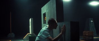 Movie still from “Husky - Invisible” (2021), directed by Evgenii Bakirov – Medium shot, Low angle