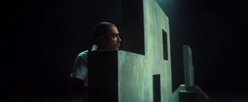 Movie still from “Husky - Invisible” (2021), directed by Evgenii Bakirov – Medium shot, Low angle