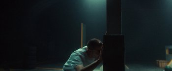 Movie still from “Husky - Invisible” (2021), directed by Evgenii Bakirov – Medium shot, Low angle