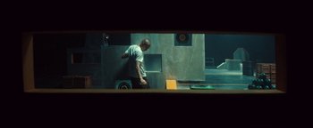 Movie still from “Husky - Invisible” (2021), directed by Evgenii Bakirov – Medium shot, Low angle
