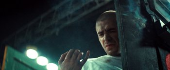 Movie still from “Husky - Invisible” (2021), directed by Evgenii Bakirov – Close Up shot, Low angle
