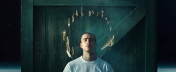 Movie still from “Husky - Invisible” (2021), directed by Evgenii Bakirov – Medium shot, Low angle