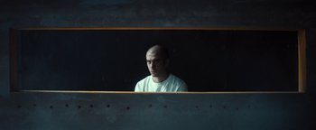 Movie still from “Husky - Invisible” (2021), directed by Evgenii Bakirov – Medium shot, Low angle