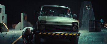 Movie still from “Husky - Invisible” (2021), directed by Evgenii Bakirov – Medium shot, Low angle