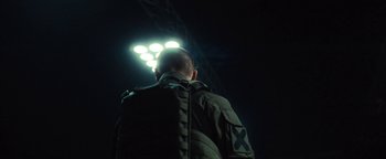 Movie still from “Husky - Invisible” (2021), directed by Evgenii Bakirov – Medium shot, Low angle