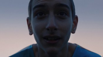 Movie still from “BadBadNotGood - Beside April” (2021), directed by Camille Summers-Valli – Close Up shot, Low angle