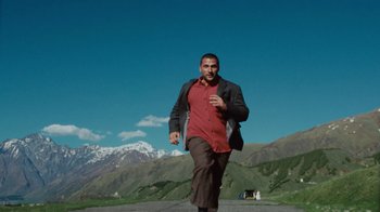 Movie still from “BadBadNotGood - Beside April” (2021), directed by Camille Summers-Valli – Wide shot, Low angle