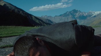 Movie still from “BadBadNotGood - Beside April” (2021), directed by Camille Summers-Valli – Medium shot, Low angle