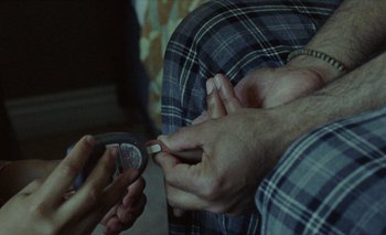 Movie still from “Desirée Dawson - Meet You At The Light” (2021), directed by Alexander Farah – Extreme Close Up shot, High angle