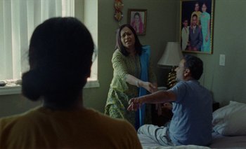 Movie still from “Desirée Dawson - Meet You At The Light” (2021), directed by Alexander Farah – Medium shot, Over the shoulder angle