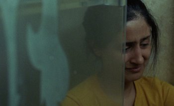 Movie still from “Desirée Dawson - Meet You At The Light” (2021), directed by Alexander Farah – Extreme Close Up shot, High angle
