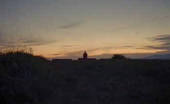 Movie still from “Desirée Dawson - Meet You At The Light” (2021), directed by Alexander Farah – Extreme Wide shot, Low angle