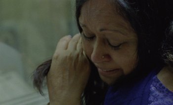 Movie still from “Desirée Dawson - Meet You At The Light” (2021), directed by Alexander Farah – Extreme Close Up shot, High angle