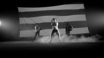 Movie still from “Skrillex, Justin Bieber & Don Toliver - Don’t Go” (2021), directed by Salomon Ligthelm – Wide shot, Low angle