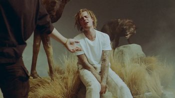 Movie still from “Skrillex, Justin Bieber & Don Toliver - Don’t Go” (2021), directed by Salomon Ligthelm – Medium shot, Low angle