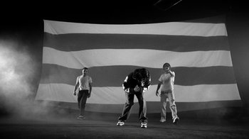 Movie still from “Skrillex, Justin Bieber & Don Toliver - Don’t Go” (2021), directed by Salomon Ligthelm – Wide shot, Low angle