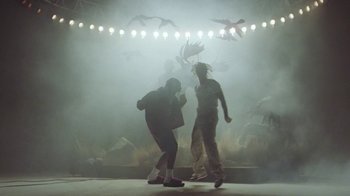 Movie still from “Skrillex, Justin Bieber & Don Toliver - Don’t Go” (2021), directed by Salomon Ligthelm – Wide shot, Low angle