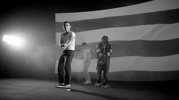 Movie still from “Skrillex, Justin Bieber & Don Toliver - Don’t Go” (2021), directed by Salomon Ligthelm – Wide shot, Low angle