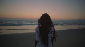 Movie still from “Masego - Mystery Lady” (2021), directed by Douglas Bernardt – Medium shot, High angle