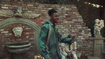 Movie still from “Masego - Mystery Lady” (2021), directed by Douglas Bernardt – Medium shot, Low angle