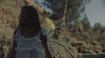 Movie still from “Masego - Mystery Lady” (2021), directed by Douglas Bernardt – Medium shot, Low angle