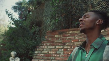 Movie still from “Masego - Mystery Lady” (2021), directed by Douglas Bernardt – Close Up shot, Low angle