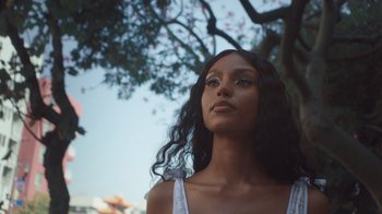 Movie still from “Masego - Mystery Lady” (2021), directed by Douglas Bernardt – Close Up shot, Low angle
